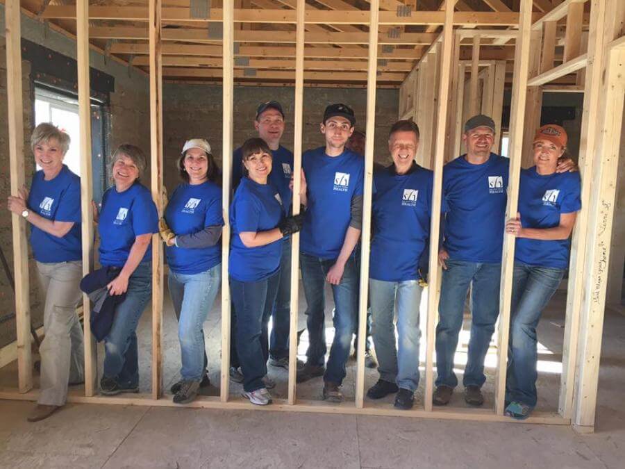 Employees Volunteering at the Habitat for Humanity