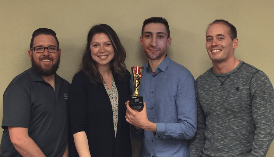 production team with award