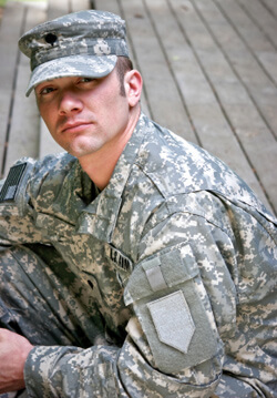 Man wearing ACU army fatigues. 